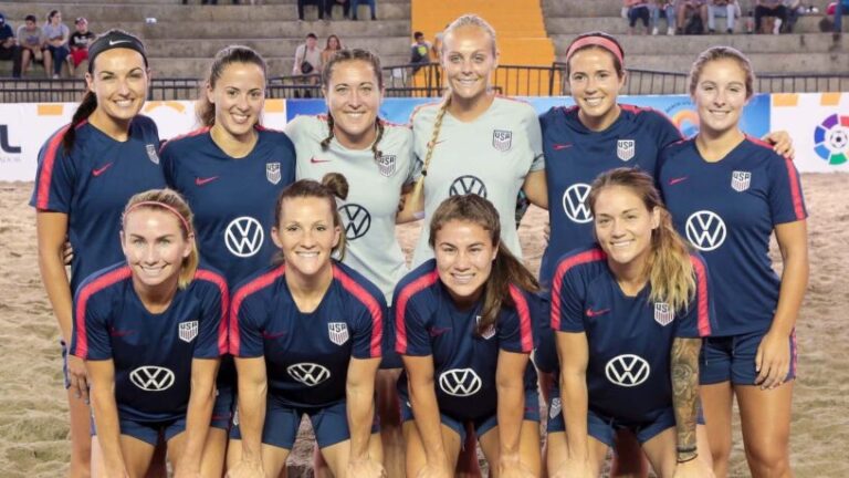 group picture of women beach soccer players