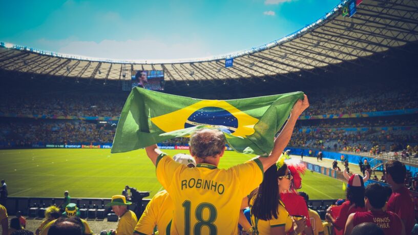 People in stadium watch FIFA game